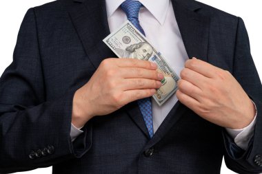 Amerikan dolarlarını elinde tutan bir işadamı.