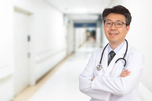 Asian Middle Aged Male Doctor Smiling Hospital Corridor — Stock Photo, Image