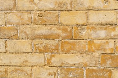 Sarı tuğlalı arka plan. Arkaplan için taş dokusu