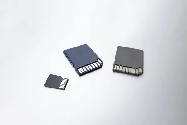 Three Micro Memory Cards Gray Background Selective Focus Concept Memory — Stock Photo, Image