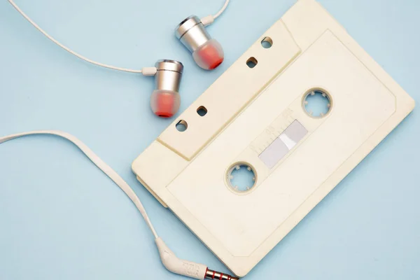 retro cassette from tape recorder with tape and records of the 80s and 90s