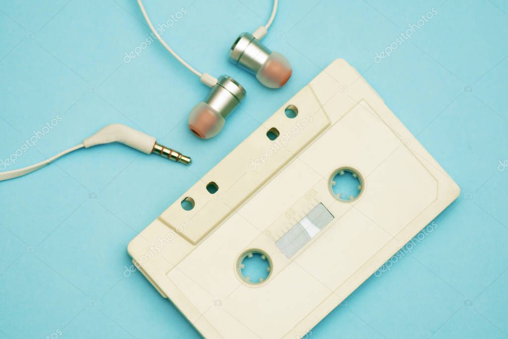 retro cassette from tape recorder with tape and records of the 80s and 90s