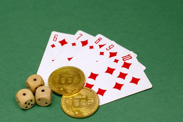 Poker game objects - game cards, dice and bitcoins on a green background — Stock Photo, Image