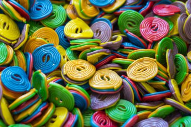 Arka plan ve tatlı lezzetli jöle şekerler ve marmelat doku. Parlak çok renkli renk.