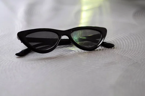 glasses on a table sunglasses