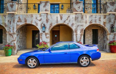 Westlake, Texas - August 23, 2020: Side view of a blue 2001 Honda Prelude performance car. The two-door sport coupe was produced by Honda from 1978 until 2001. clipart