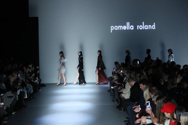 NEW YORK, NY - FEBRUARY 08: Models walk the runway finale at Pamella Roland Runway on February 2018 New York Fashion Week at Pier 59 on February 8, 2018 in New York City.