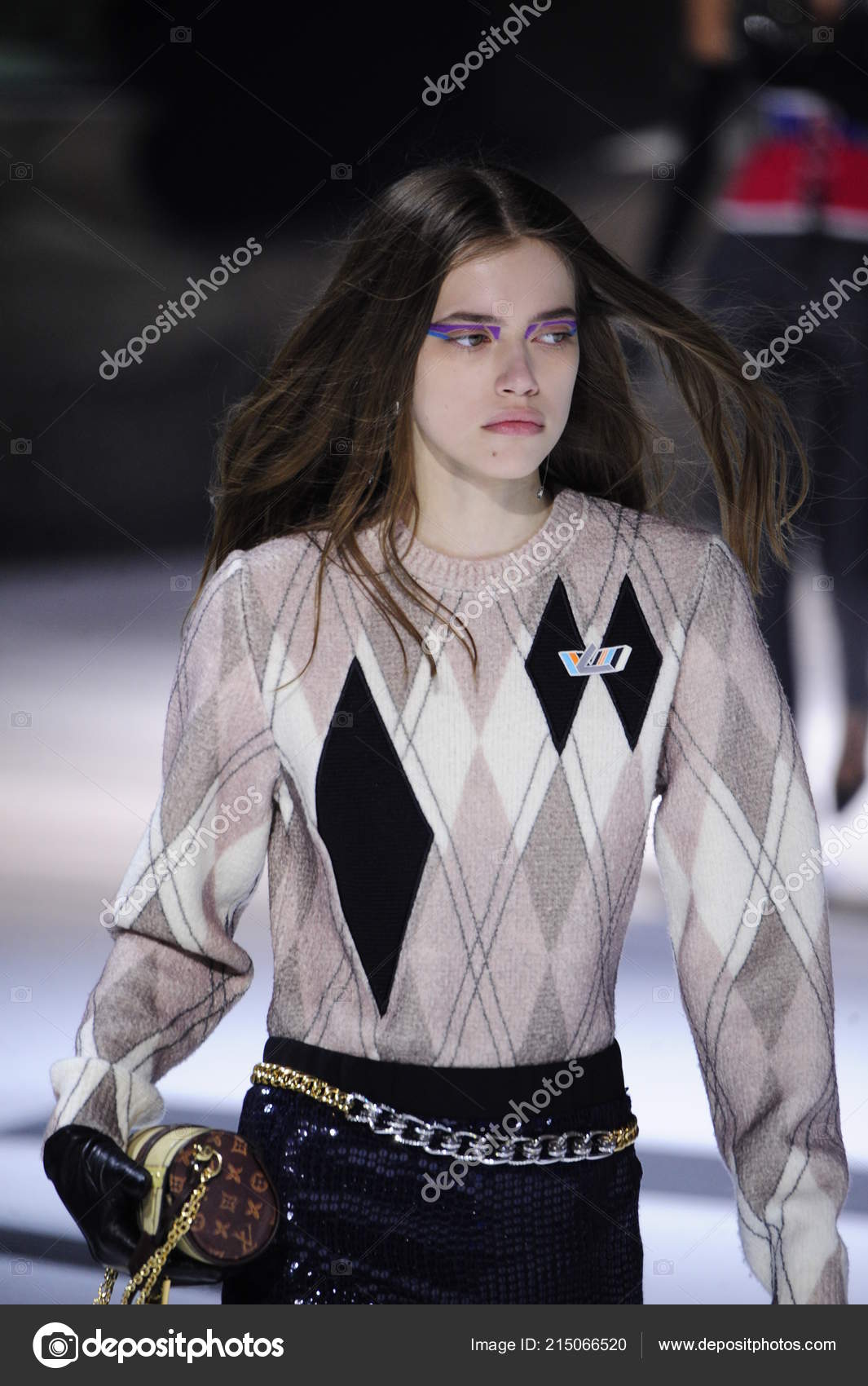 Model walks on the runway during the Louis Vuitton fashion show