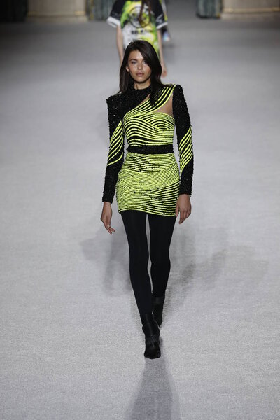 PARIS, FRANCE - MARCH 02: A model walks the runway during the Balmain show as part of the Paris Fashion Week Womenswear Fall/Winter 2018/2019 on March 2, 2018 in Paris, France.