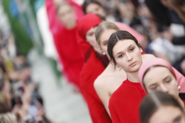 PARIS, FRANCE - MARCH 04: Models walk the runway finale during the Valentino show as part of the Paris Fashion Week Womenswear Fall/Winter 2018/2019 on March 4, 2018 in Paris, France. clipart