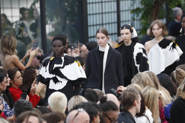 PARIS, FRANCE - MARCH 04: Models walk the runway finale during the Valentino show as part of the Paris Fashion Week Womenswear Fall/Winter 2018/2019 on March 4, 2018 in Paris, France.