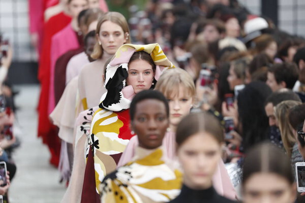 PARIS, FRANCE - MARCH 04: Models walk the runway finale during the Valentino show as part of the Paris Fashion Week Womenswear Fall/Winter 2018/2019 on March 4, 2018 in Paris, France.