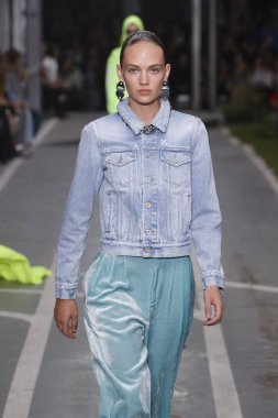 PARIS, FRANCE - SEPTEMBER 27: Adrienne Juliger walks the runway during the Off-White show as part of Paris Fashion Week Womenswear Spring/Summer 2019 on September 27, 2018 in Paris, France. clipart