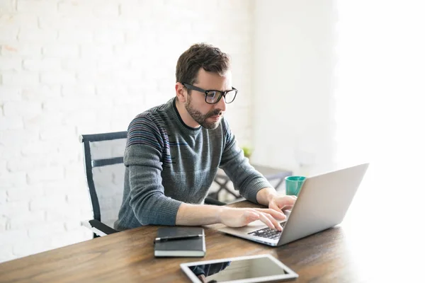 Handsome Young Latin Man Working Laptop While Sitting Table His — Stock Photo, Image