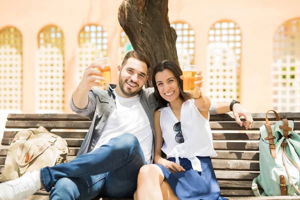 Cheerful Pretty Woman Sharing Glass Beer Handsome Boyfriend Outdoor Bench — Stock Photo, Image