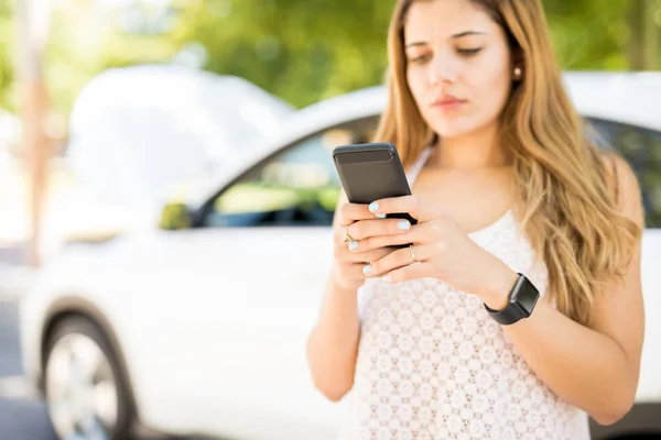 Woman Standing Broken Car Parked Road Texting Roadside Assistance Help — Stock Photo, Image