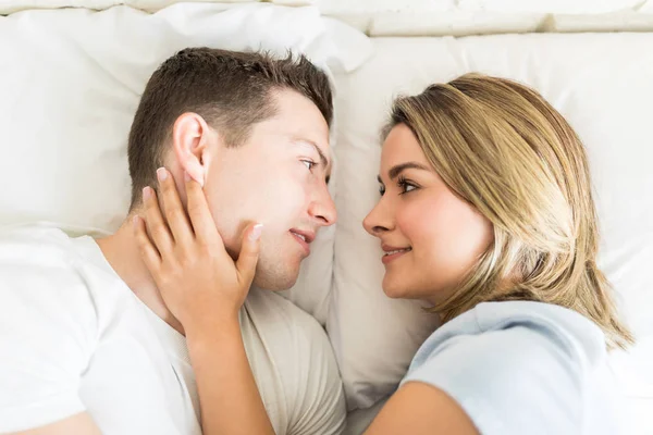 Loving Young Woman Touching Man While Resting Bed Home — Stock Photo, Image