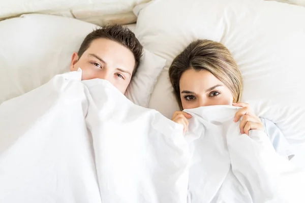 Boyfriend Girlfriend Hiding White Blanket While Lying Bed Home — Stock Photo, Image