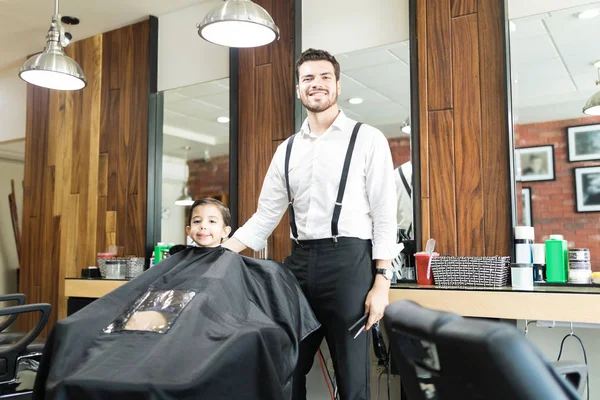 Portrait Confident Hairstylist Standing Customer Sitting Haircut Barber Shop — Stock Photo, Image