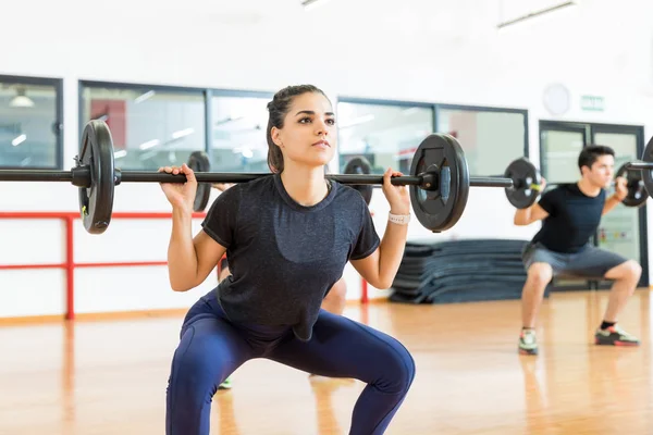 Dedicated Female Client Exercising Barbell Health Club — Stock Photo, Image