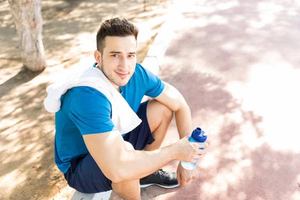 Overhead View Tired Athlete Water Bottle Sitting Park — Stock Photo, Image