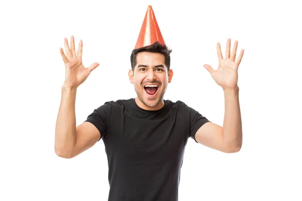 Portrait Young Man Wearing Party Hat While Enjoying Birthday Party — Stock Photo, Image
