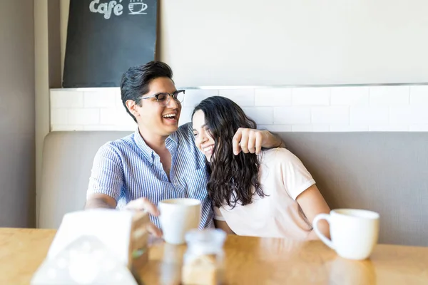 Young Couple Sharing Jokes Laughing While Having Coffee Cafe — Stock Photo, Image