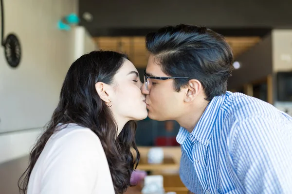 Side View Young Man Woman Eyes Closed Kissing Lips Restaurant — Stock Photo, Image