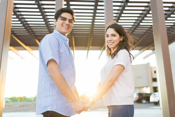 Portrait Smiling Young Man Woman Holding Hands While Having Fun — Stock Photo, Image