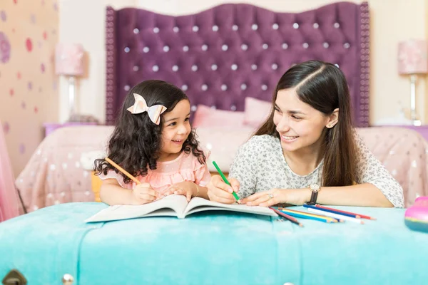 Happy Mother Daughter Drawing Together While Looking Each Other Bedroom — Stock Photo, Image