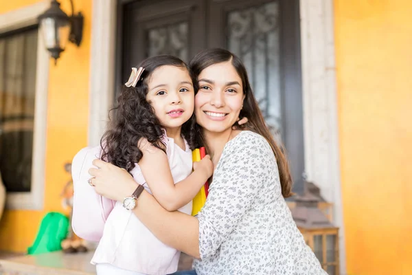 Portrait Attractive Nanny Smiling While Hugging Cute Girl Leaving Kindergarten — Stock Photo, Image