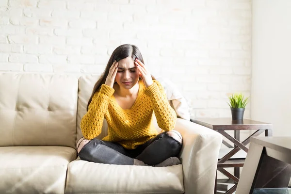 Brunette Suffering Migraine While Sitting Living Room — Stock Fotó