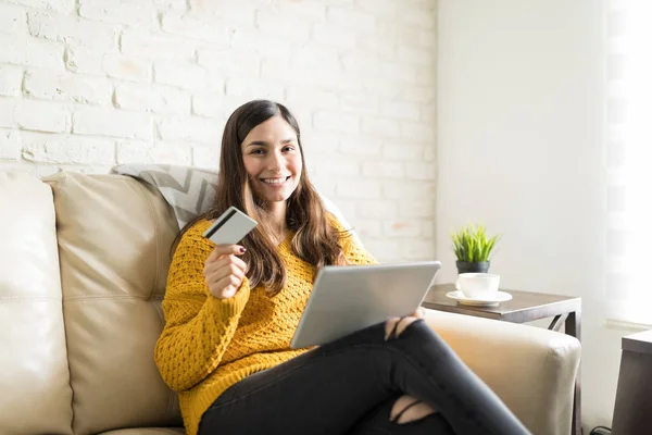 Portrait Brunette Woman Plastic Card Digital Tablet Sitting Sofa — 스톡 사진