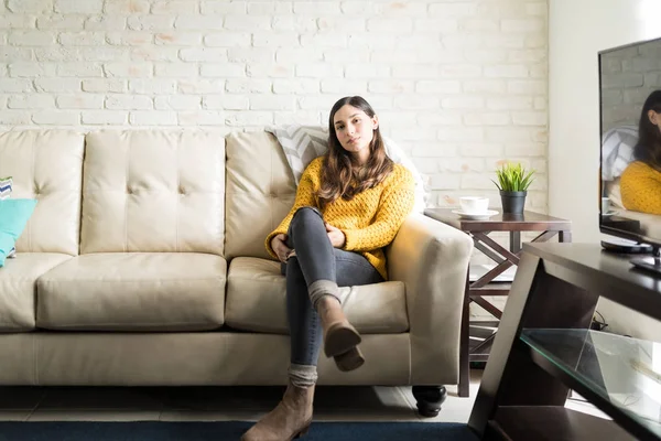 Full Length Portrait Confident Young Woman Sitting Sofa Home — Stock Photo, Image