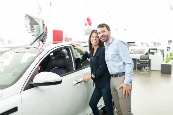 Happy Hispanic Partners Standing New Car Dealership — Stock Photo, Image