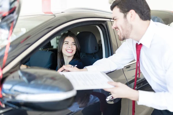 Salesman Financial Document Talking Client Sitting New Car Showroom — Stock Photo, Image
