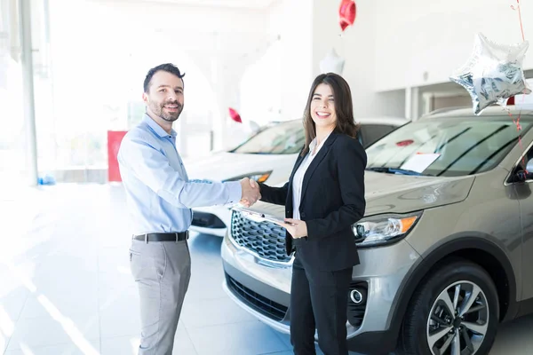 Confident Sales Manager Making Client Feel Comfortable Buying Car Showroom — Stock Photo, Image