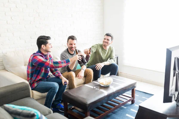 Soccer Fans Making Toast Beer Bottles While Watching Game Home — Stock Photo, Image