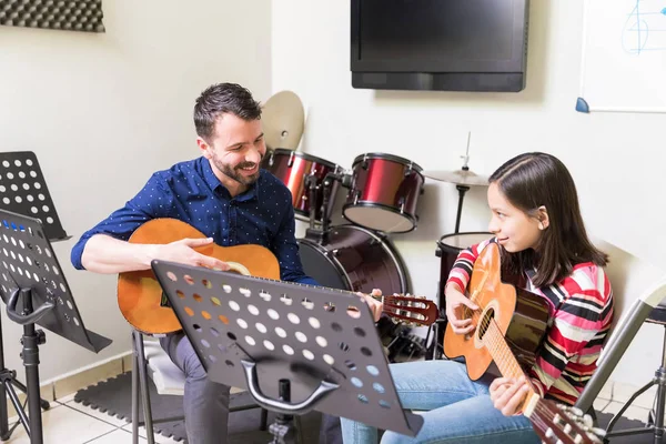 Happy Latin Music School Teacher Student Playing Guitars Together — Stock Photo, Image