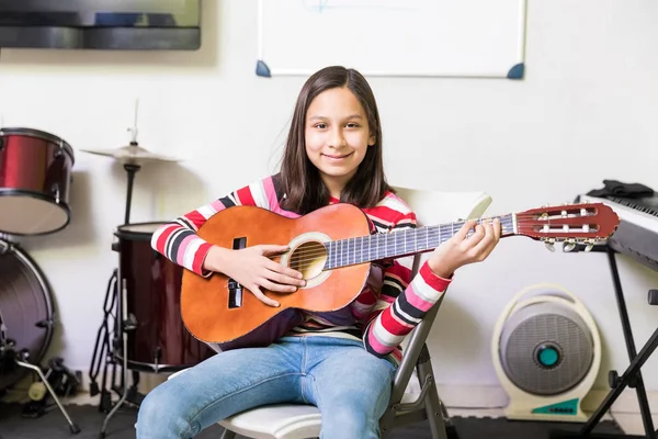 Happy Teen Girl Playing Guitar Confidently Her Extracurricular Activity Classes — Stock Photo, Image
