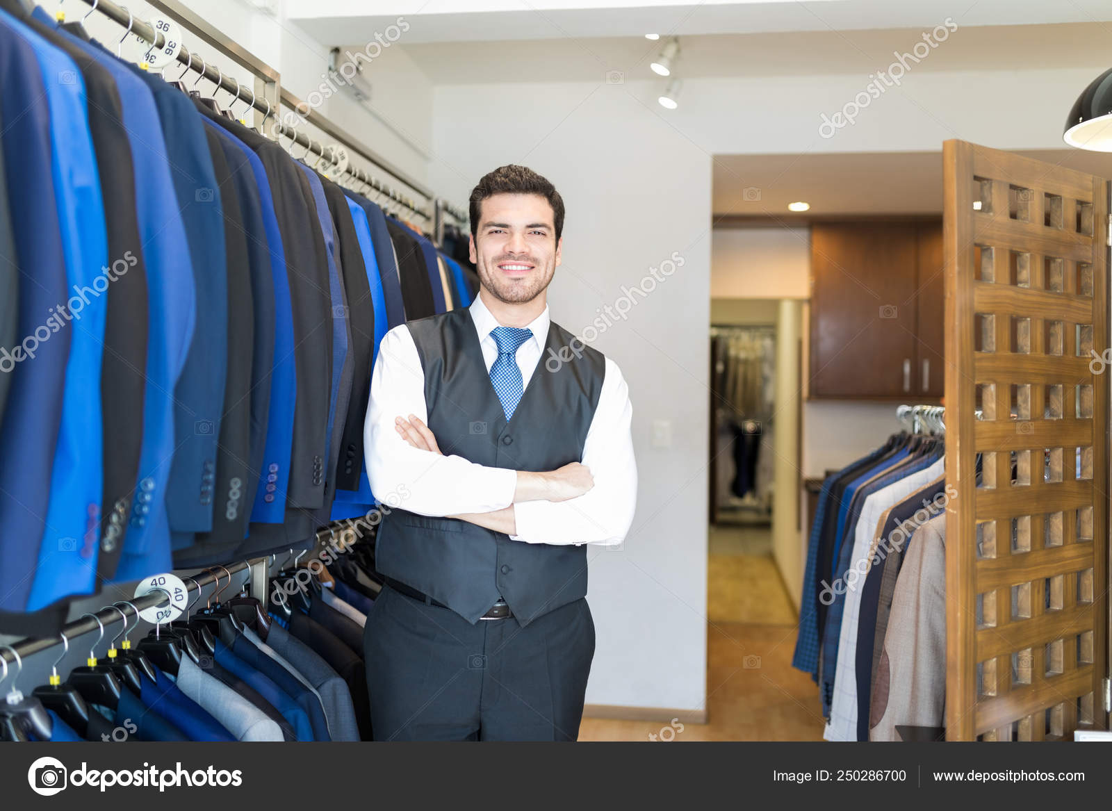 Portrait Latin Entrepreneur Waistcoat Standing Arms Crossed