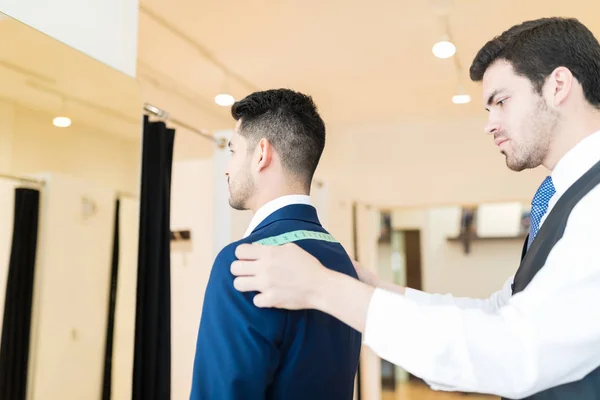 Good Looking Tailor Taking Measurements Customer Sewing Suit Workshop — Stock Photo, Image