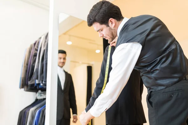 Seamster Taking Measurement Suit Alter Client Requirement — стоковое фото