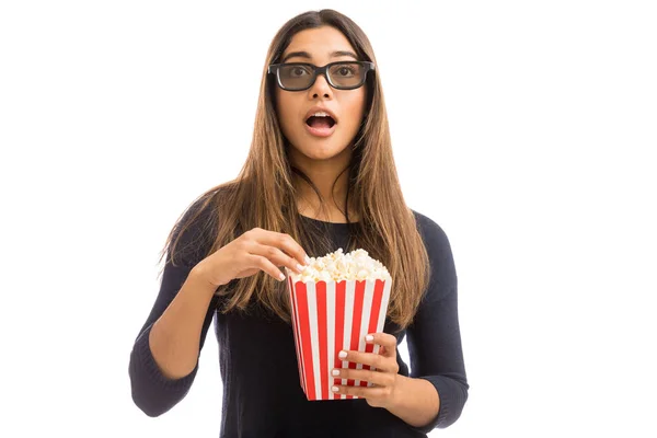 Surprised Female Hipster Holding Basket Full Popcorn While Enjoying Film — Stock Photo, Image