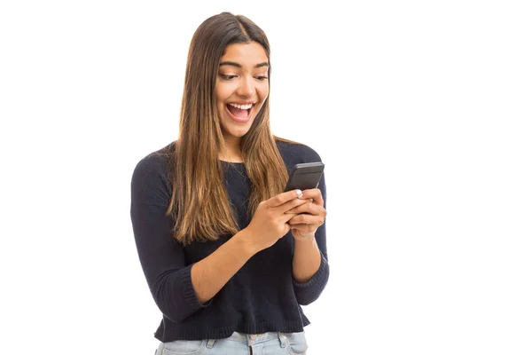 Excited Beautiful Woman Receiving Sms Mobile Phone Plain Background — Stock Photo, Image