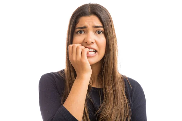 Closeup Nervous Young Woman Biting Nails White Background — Stock Photo, Image