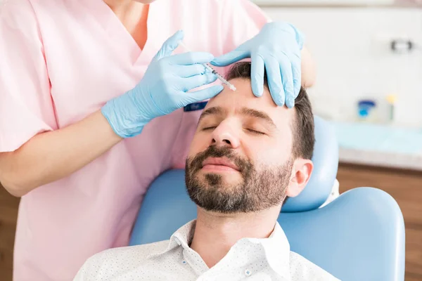 Calm Male Patient Receiving Wrinkle Smoothing Injection Surgeon Clinic — Stock Photo, Image