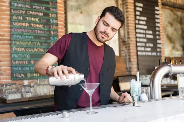 Latin Bartender Pouring Cocktail Martini Glass Bar Counter — Stock Photo, Image