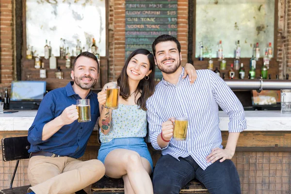 Young Friends Enjoying Beer While Sitting Restaurant — 스톡 사진