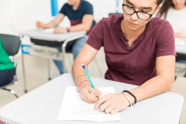 Confident Latin Student Writing Admission Test Classroom — Stock Photo, Image
